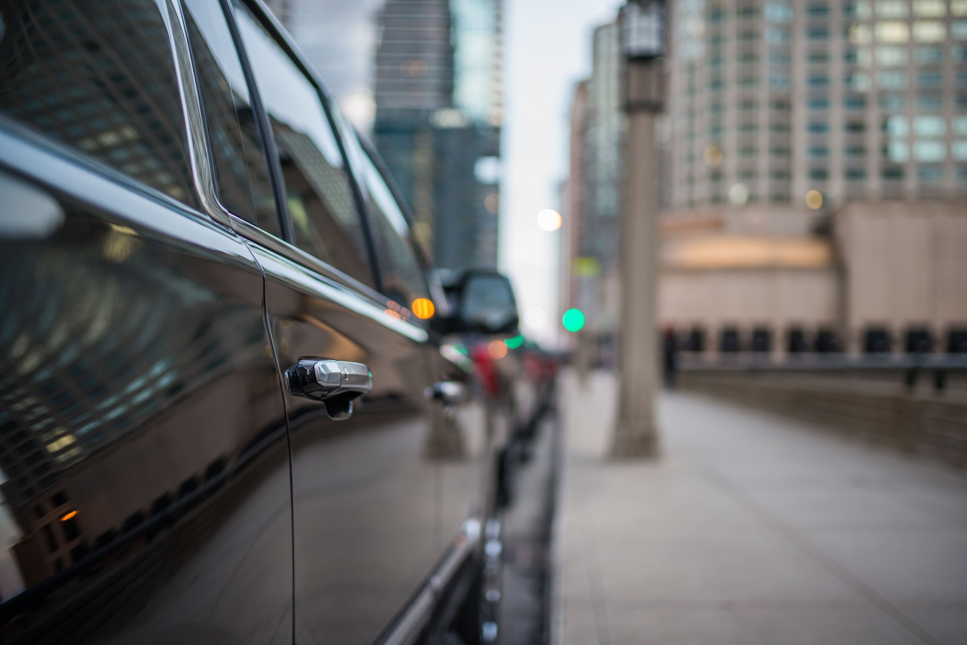 Passenger door handle of a black SUV